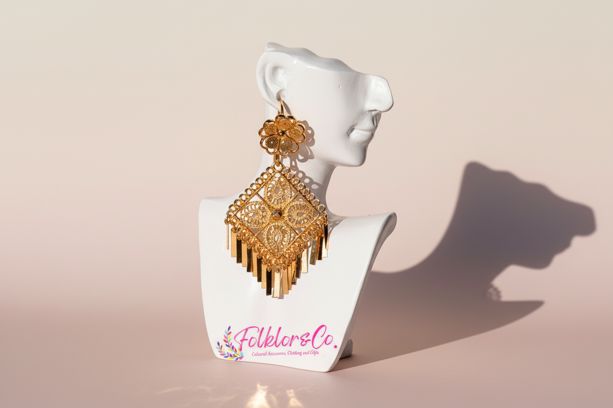 Gold Mexican Folklorico earrings on a white mannequin head with 'Folkloryco.' branding on a beige background